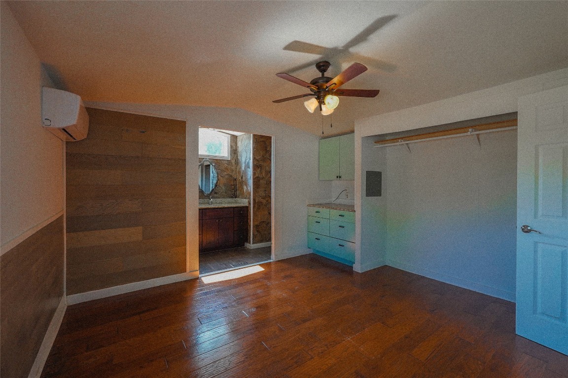 155 5th Street Maxwell, TX 78656 - Photo 8 of 34 an empty room with closet and a chandelier fan