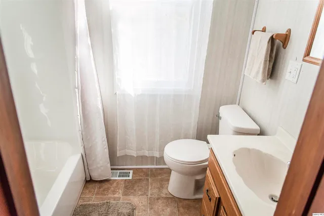 a bathroom with a sink and a toilet