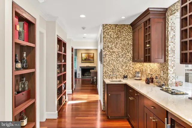 a backyard of a house with yard and outdoor seating