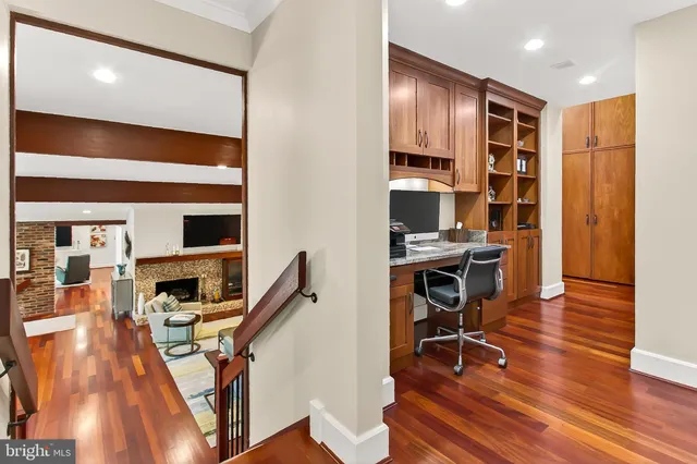 a view of a patio with table and chairs and potted plants