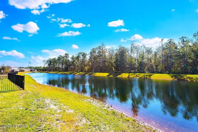 a view of swimming pool with an outdoor space and seating area