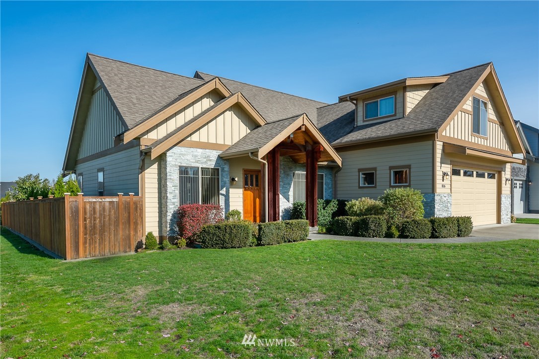 816 Red Maple Loop Everson, WA 98247 - Photo 1 of 22 a front view of a house with a yard