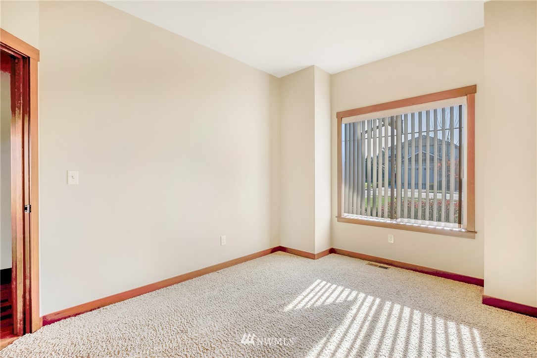 816 Red Maple Loop Everson, WA 98247 - Photo 12 of 22 a view of an empty room with a window