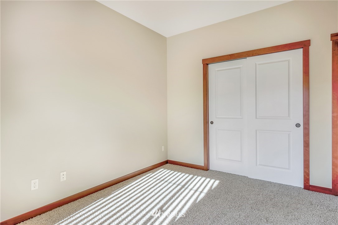 816 Red Maple Loop Everson, WA 98247 - Photo 13 of 22 a view of a room with wooden floor and closet