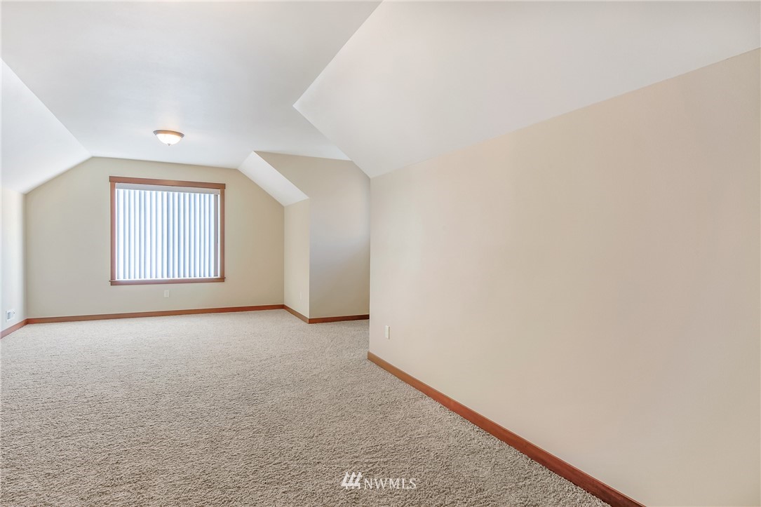 816 Red Maple Loop Everson, WA 98247 - Photo 16 of 22 an empty room with windows