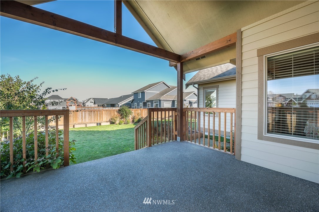 816 Red Maple Loop Everson, WA 98247 - Photo 19 of 22 a view of a porch with a backyard
