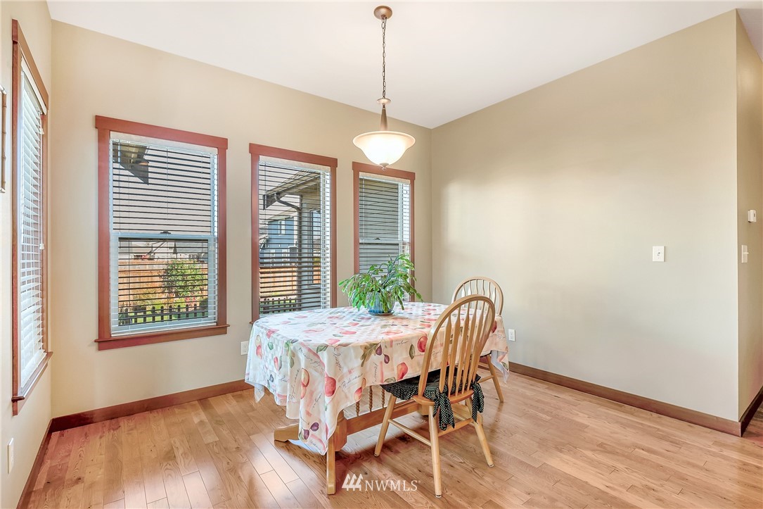 816 Red Maple Loop Everson, WA 98247 - Photo 7 of 22 a bedroom with a bed and wooden floor