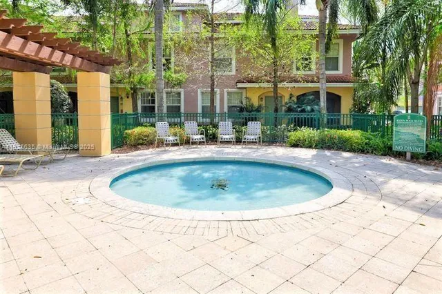 a view of outdoor space swimming pool and mountain view