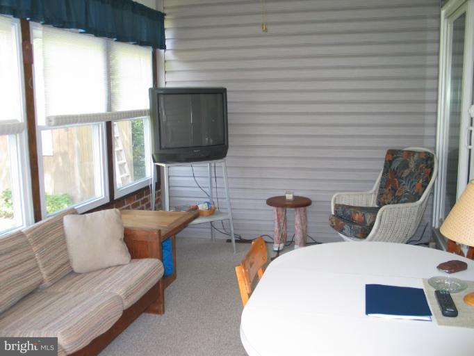 8541 Bay Road Pasadena, MD 21122 - Photo 21 of 28 enclosed porch