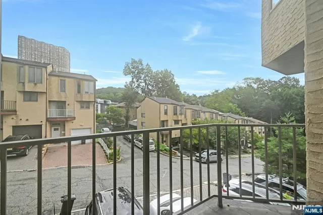 a view of a building from a balcony