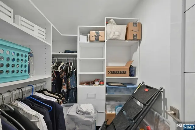 a room with furniture and a flat screen tv