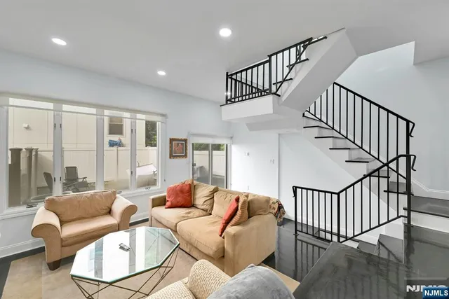 a view of livingroom with furniture and windows