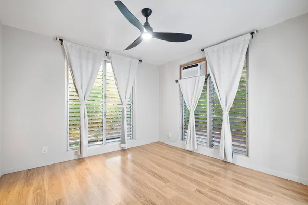an empty room with windows