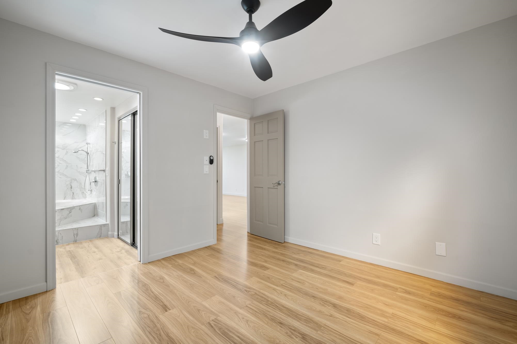1002 South Kihei Road, Unit 114 Kihei, HI 96753 - Photo 28 of 50 a view of empty room with wooden floor