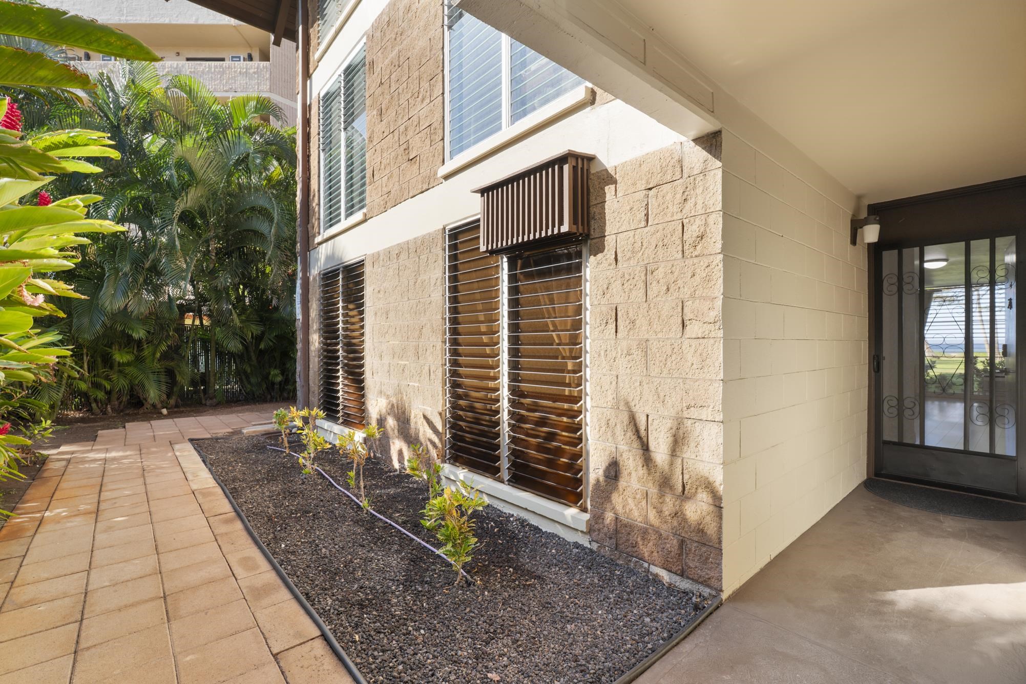 1002 South Kihei Road, Unit 114 Kihei, HI 96753 - Photo 34 of 50 a view of a back yard of the house