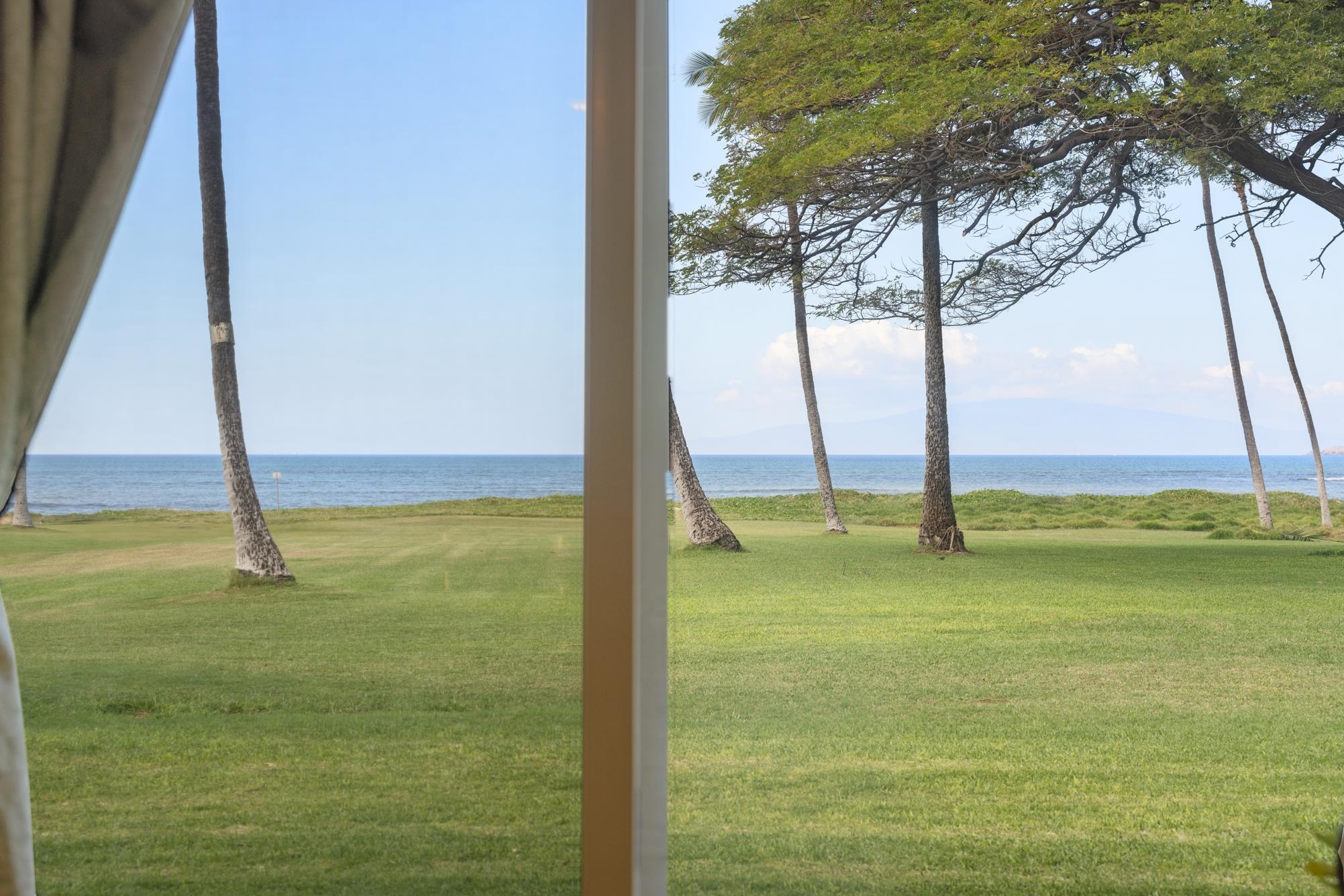 1002 South Kihei Road, Unit 114 Kihei, HI 96753 - Photo 37 of 50 a view of an ocean from a window