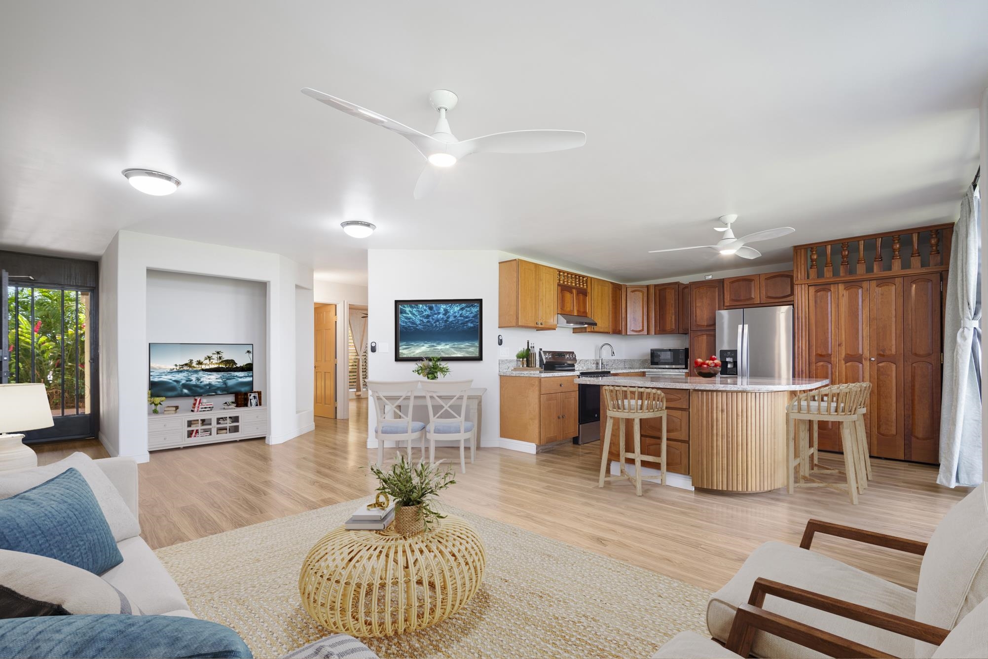 1002 South Kihei Road, Unit 114 Kihei, HI 96753 - Photo 4 of 50 a living room with furniture and kitchen view