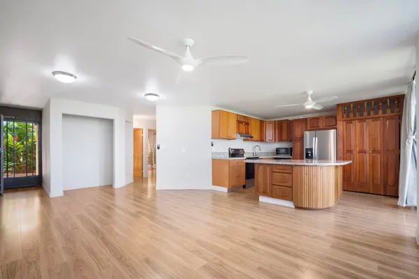 a view of kitchen with wooden floor