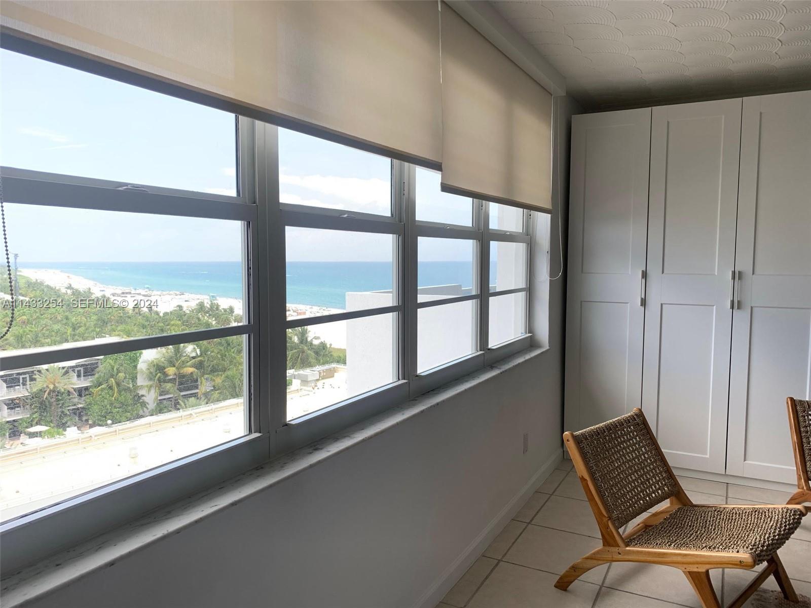 100 Lincoln Road, Unit 1039 Miami Beach, FL 33139 - Photo 3 of 26 a view of a chair in an empty room