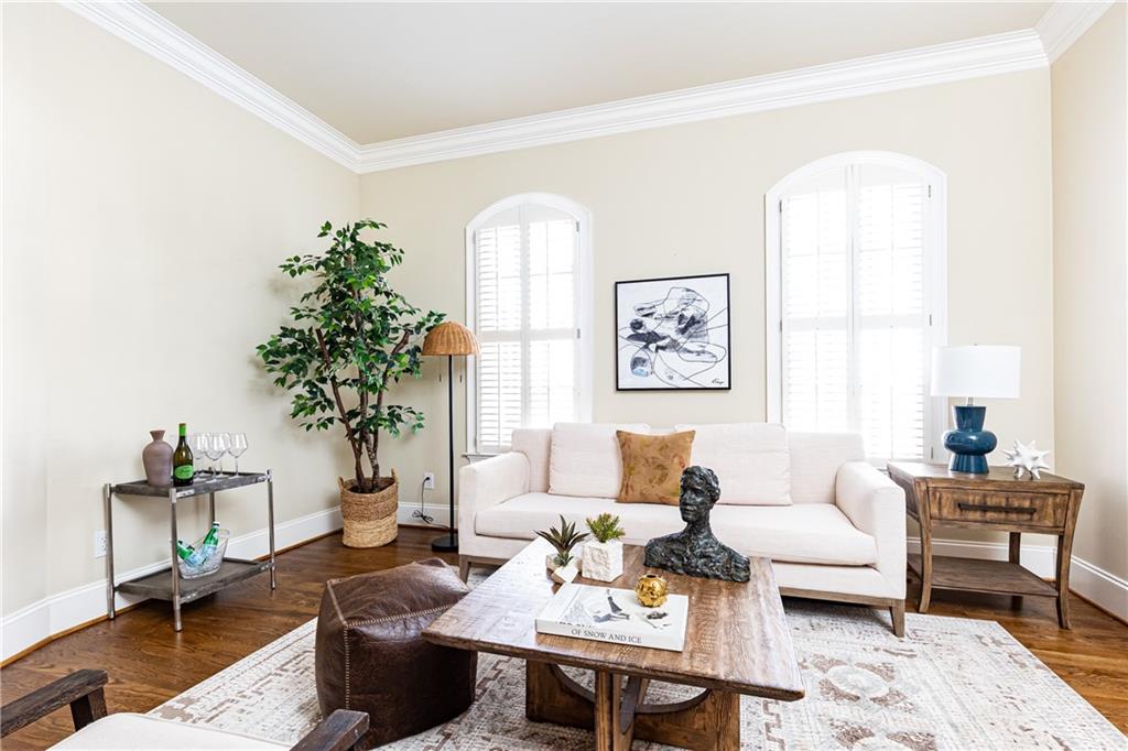 772 Springlake Lane Northwest Atlanta, GA 30318 - Photo 1 of 1 a living room with furniture a table and a potted plant
