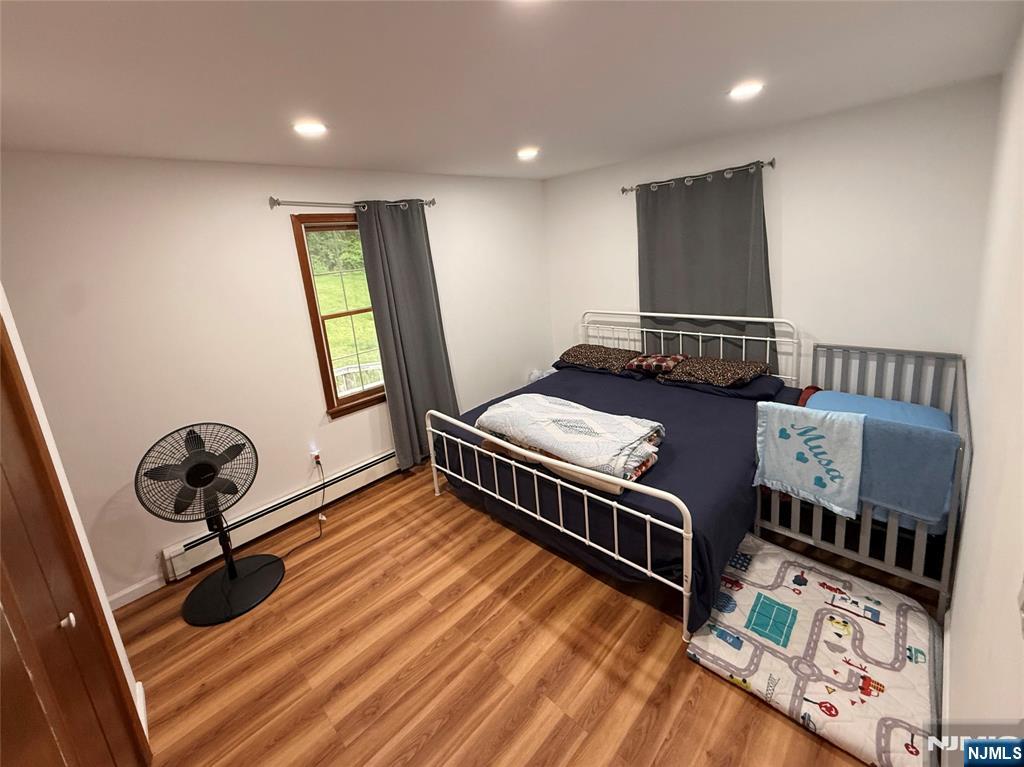 154 Cork Hill Road Franklin, NJ 07416 - Photo 10 of 35 a bedroom with furniture and a window