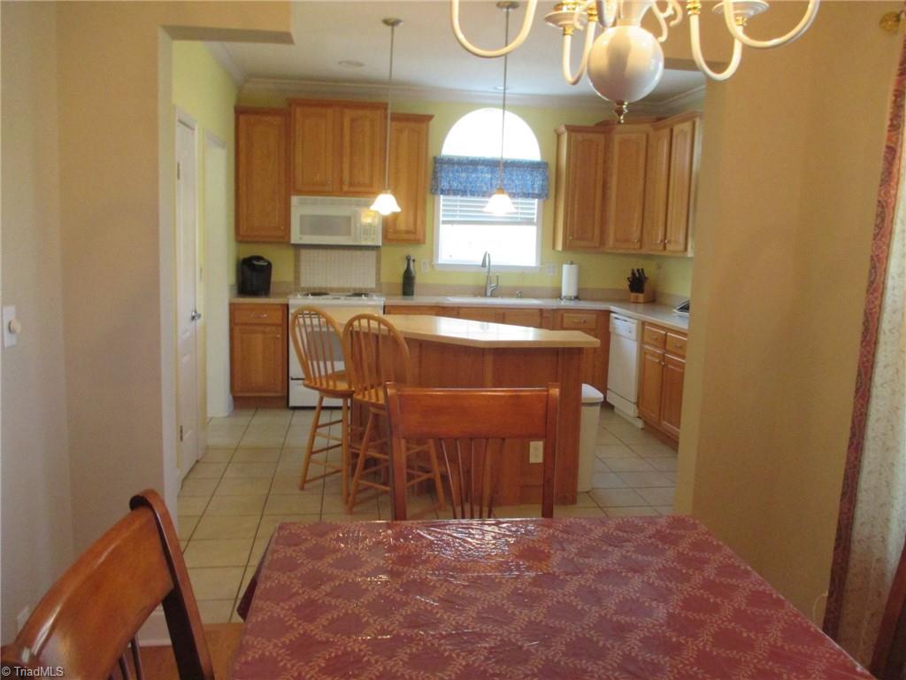 2475 Swicegood Road Linwood, NC 27299 - Photo 9 of 38 DINING ROOM LOOKING INTO KITCHEN