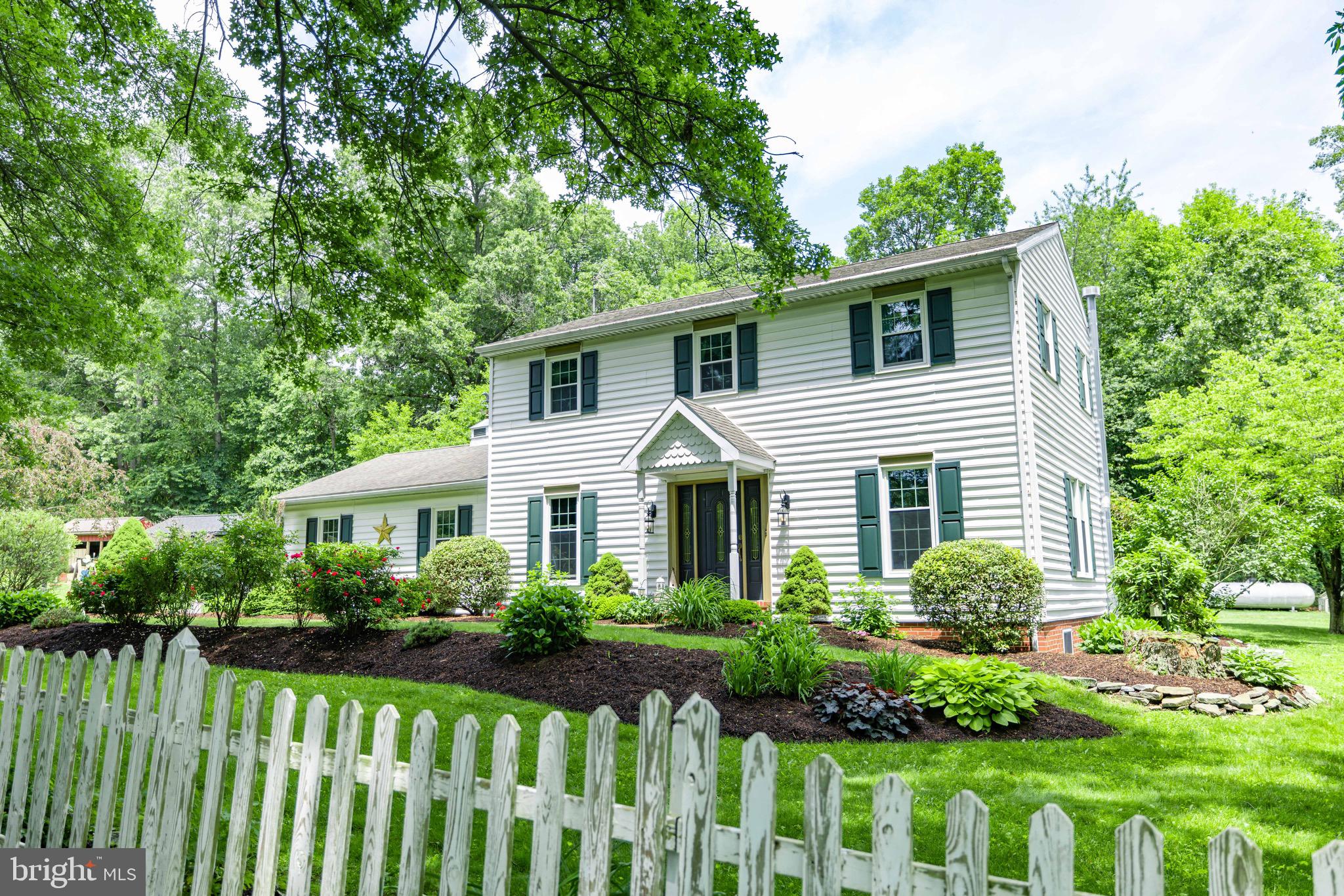 671 Gault Road Gap, PA 17527 - Photo 54 of 80 a front view of a house with a garden