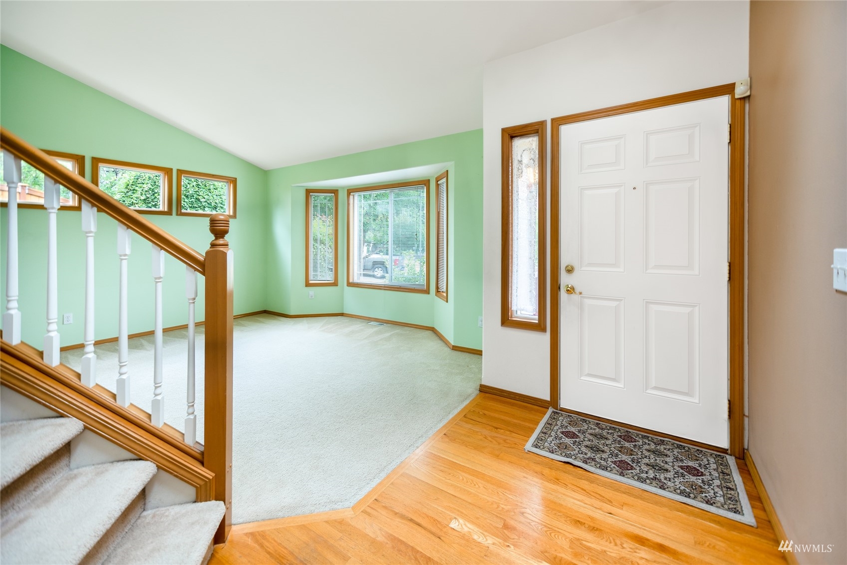 414 170th Place Southeast Bothell, WA 98012 - Photo 2 of 40 a view of livingroom with furniture and stairs