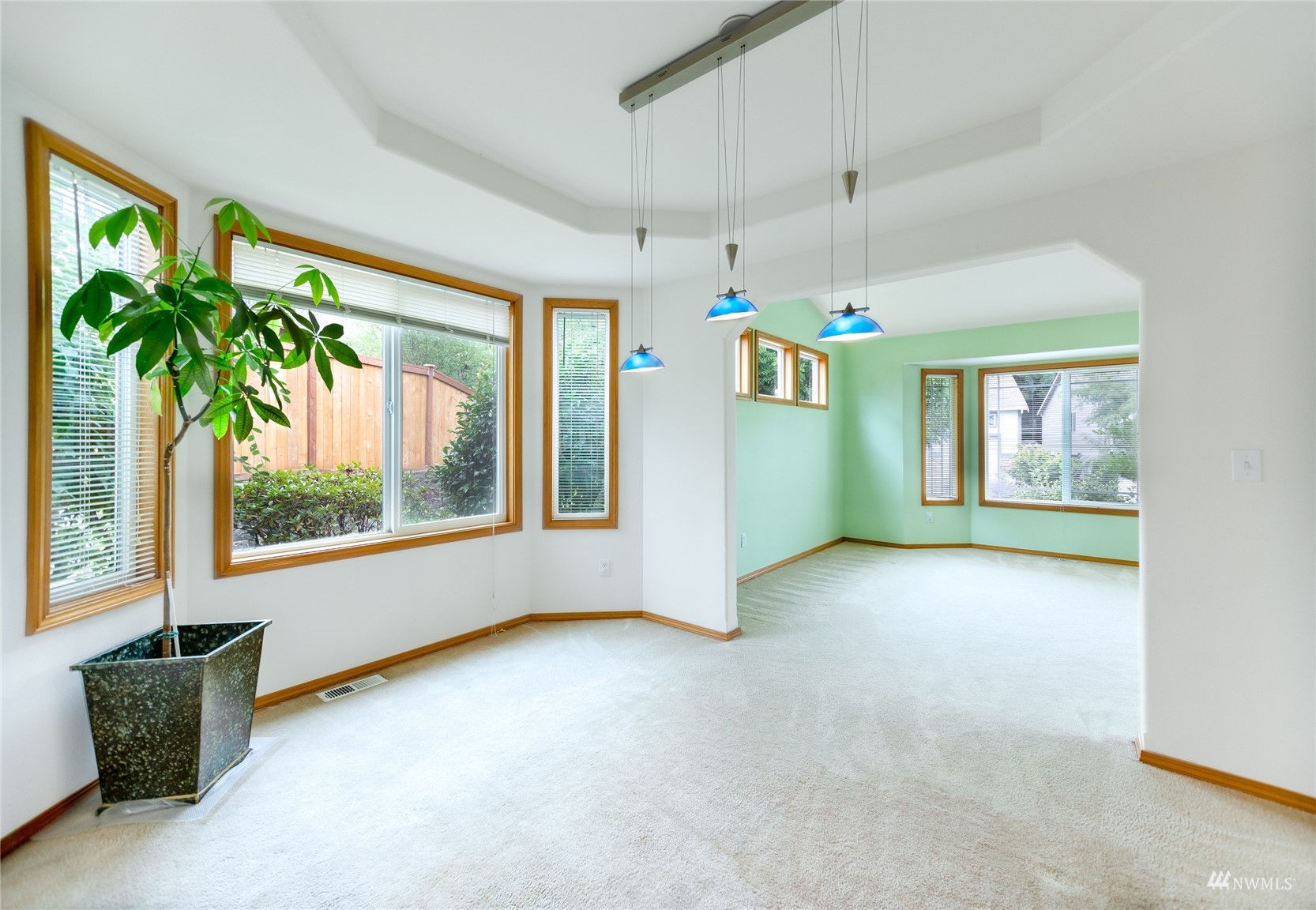 414 170th Place Southeast Bothell, WA 98012 - Photo 6 of 40 wooden floor in an empty room with a window