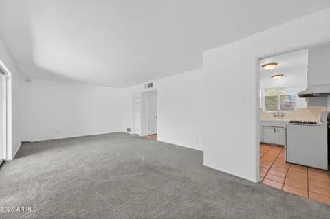 a view of a kitchen with a sink