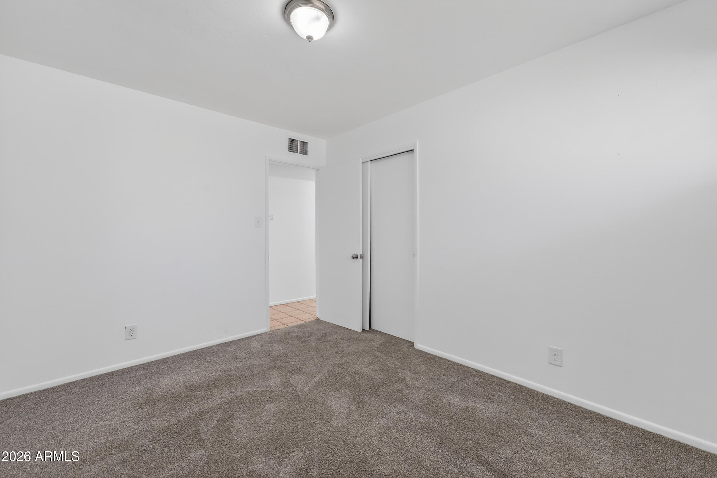 2233 West Flower Street Phoenix, AZ 85015 - Photo 16 of 36 a view of an empty room