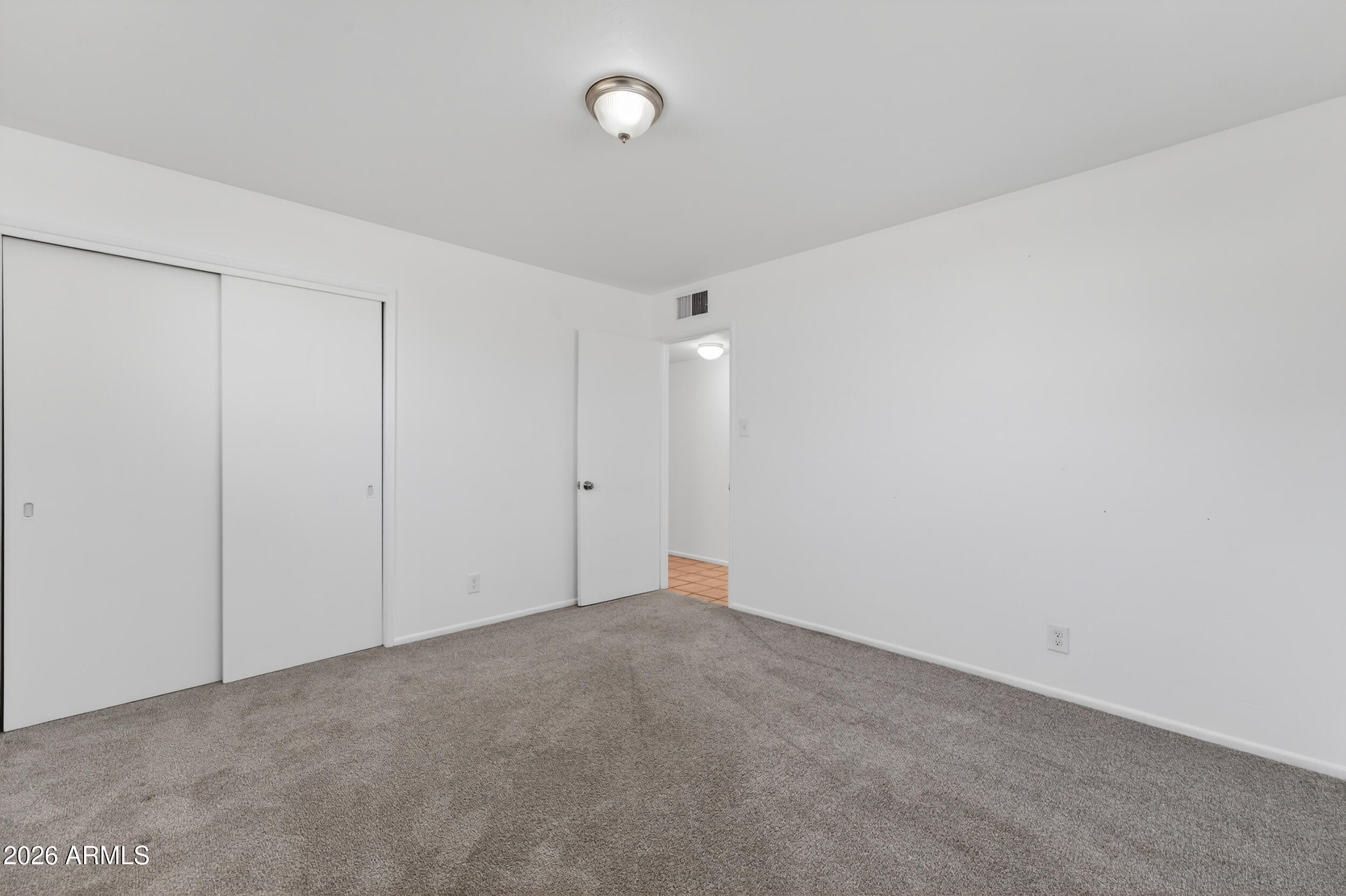 2233 West Flower Street Phoenix, AZ 85015 - Photo 18 of 36 a view of an empty room