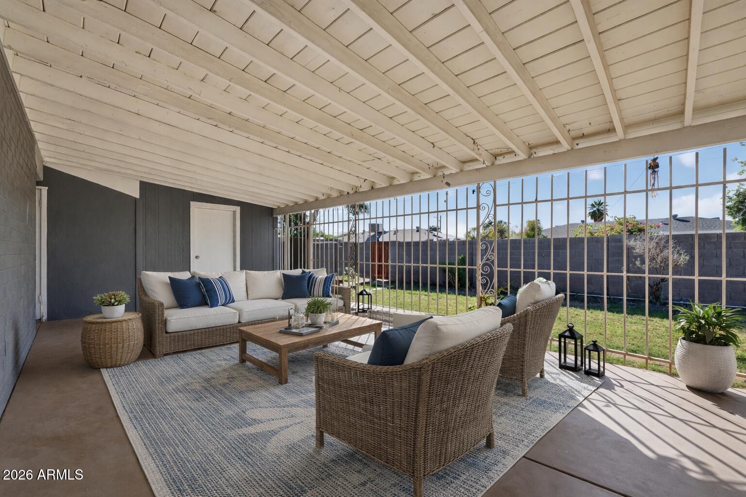 2233 West Flower Street Phoenix, AZ 85015 - Photo 28 of 36 a patio with patio couch and potted plants