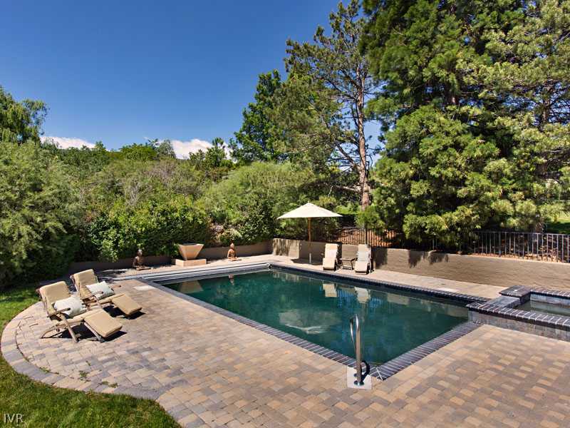3540 Frost Lane Reno, NV 89511 - Photo 7 of 9 a view of a swimming pool with a patio