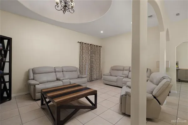 a living room with furniture and a couch