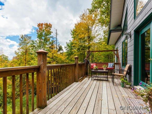 182 Flying Hawk Road Waynesville, NC 28786 - Photo 3 of 24 a view of balcony with furniture