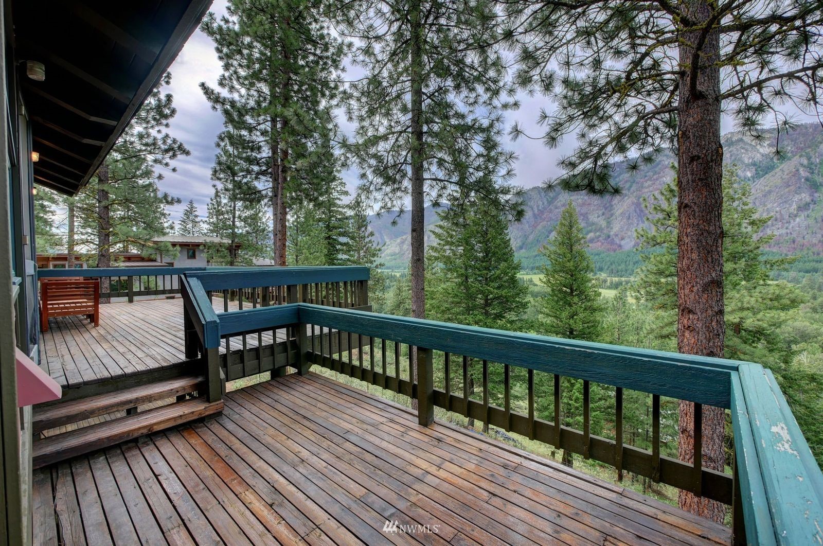 17 Cassal Road Winthrop, WA 98862 - Photo 5 of 28 a view of balcony with wooden floor and outdoor seating