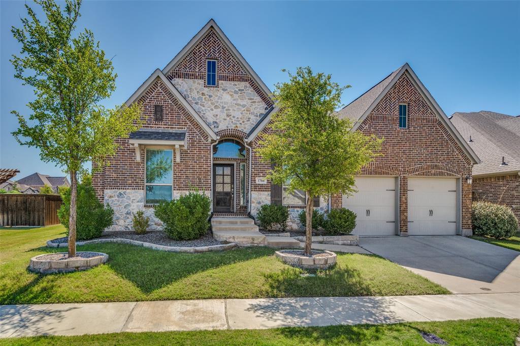1700 Lithgow Road Celina, TX 75009 - Photo 2 of 40 a front view of a house with garden