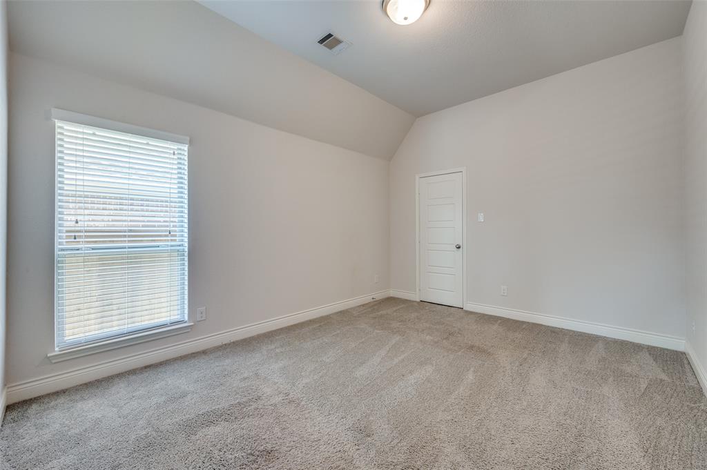 1700 Lithgow Road Celina, TX 75009 - Photo 28 of 40 an empty room with windows