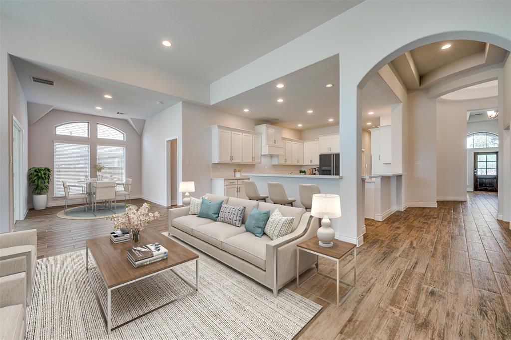 1700 Lithgow Road Celina, TX 75009 - Photo 8 of 40 a living room with furniture and a wooden floor