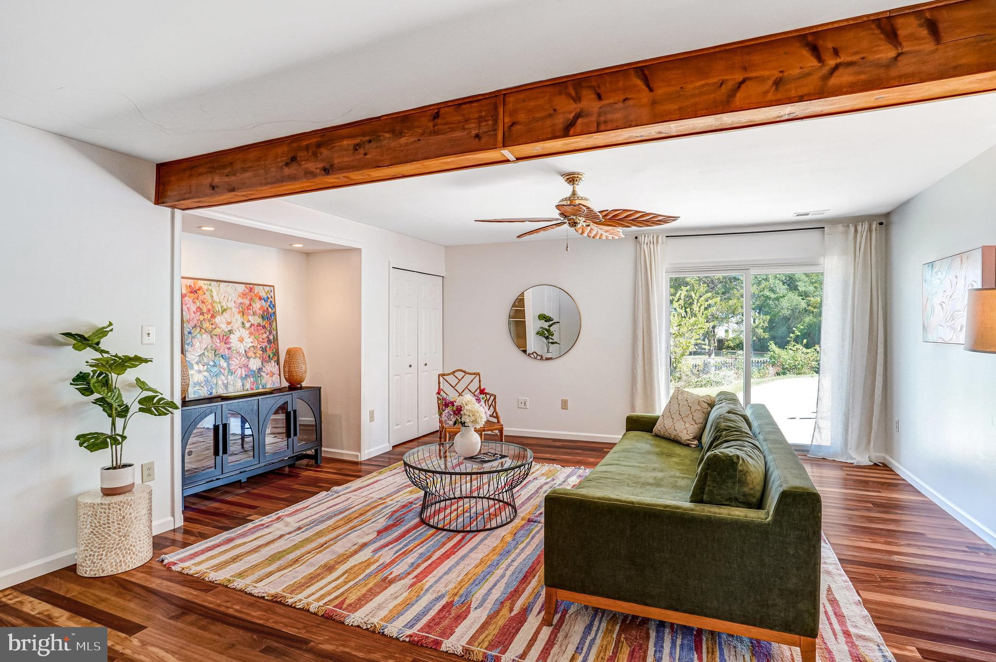 7709 Brandon Way Manassas, VA 20109 - Photo 15 of 40 a living room with furniture and a large window