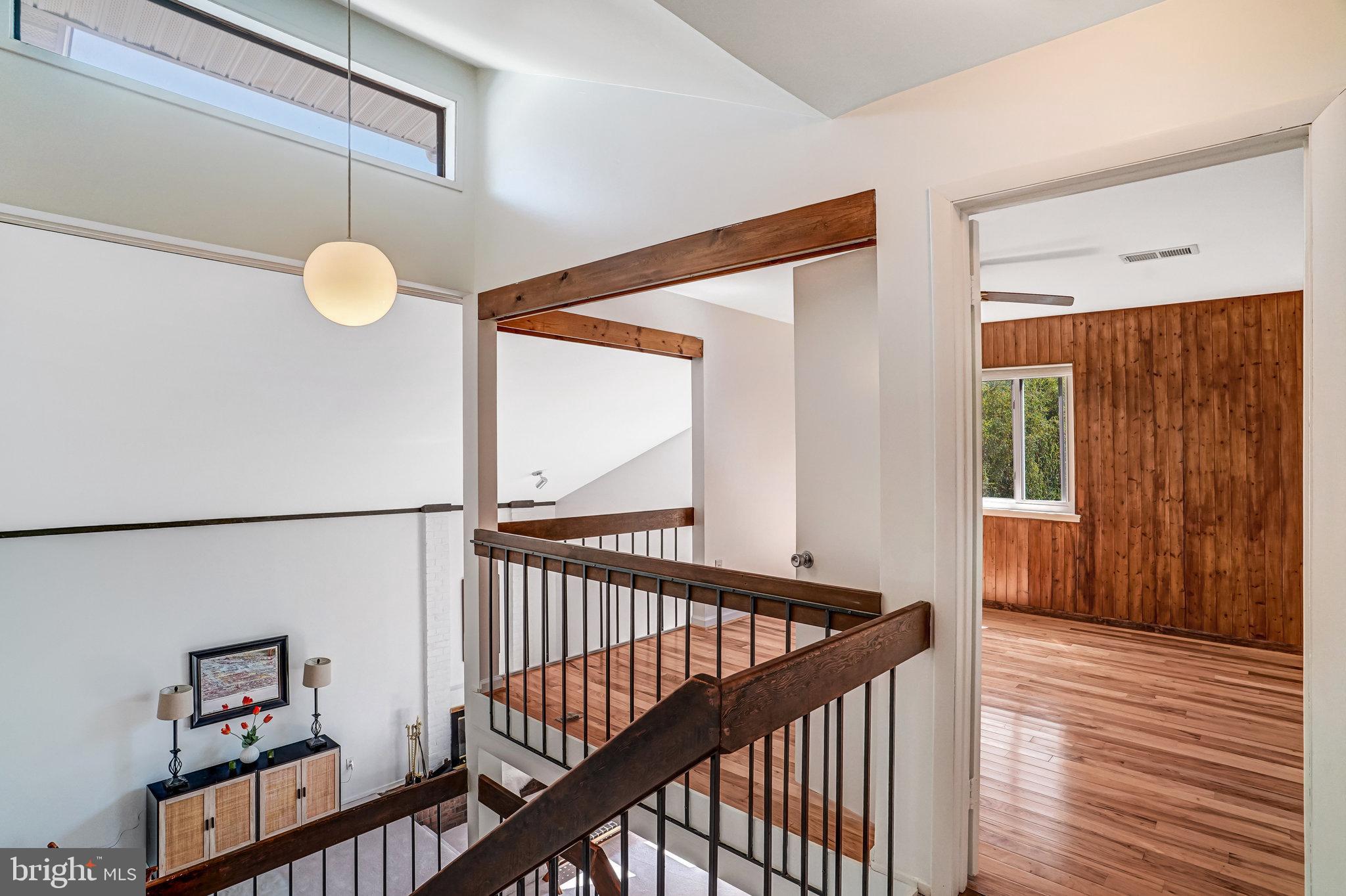 7709 Brandon Way Manassas, VA 20109 - Photo 21 of 40 a view of a hallway with wooden floor