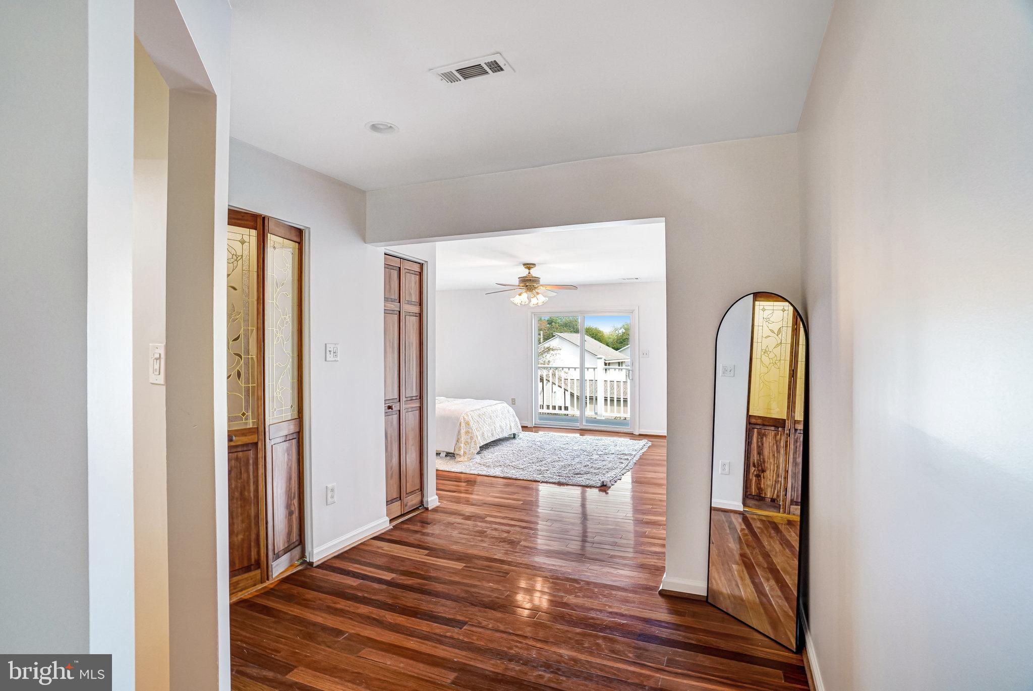 7709 Brandon Way Manassas, VA 20109 - Photo 28 of 40 a living room with furniture and a window