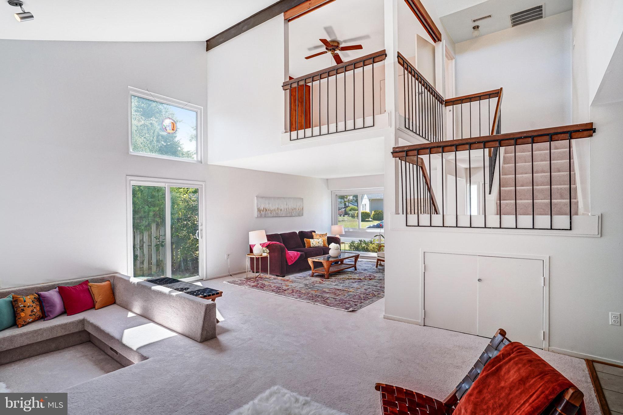 7709 Brandon Way Manassas, VA 20109 - Photo 3 of 40 a bedroom with furniture and window