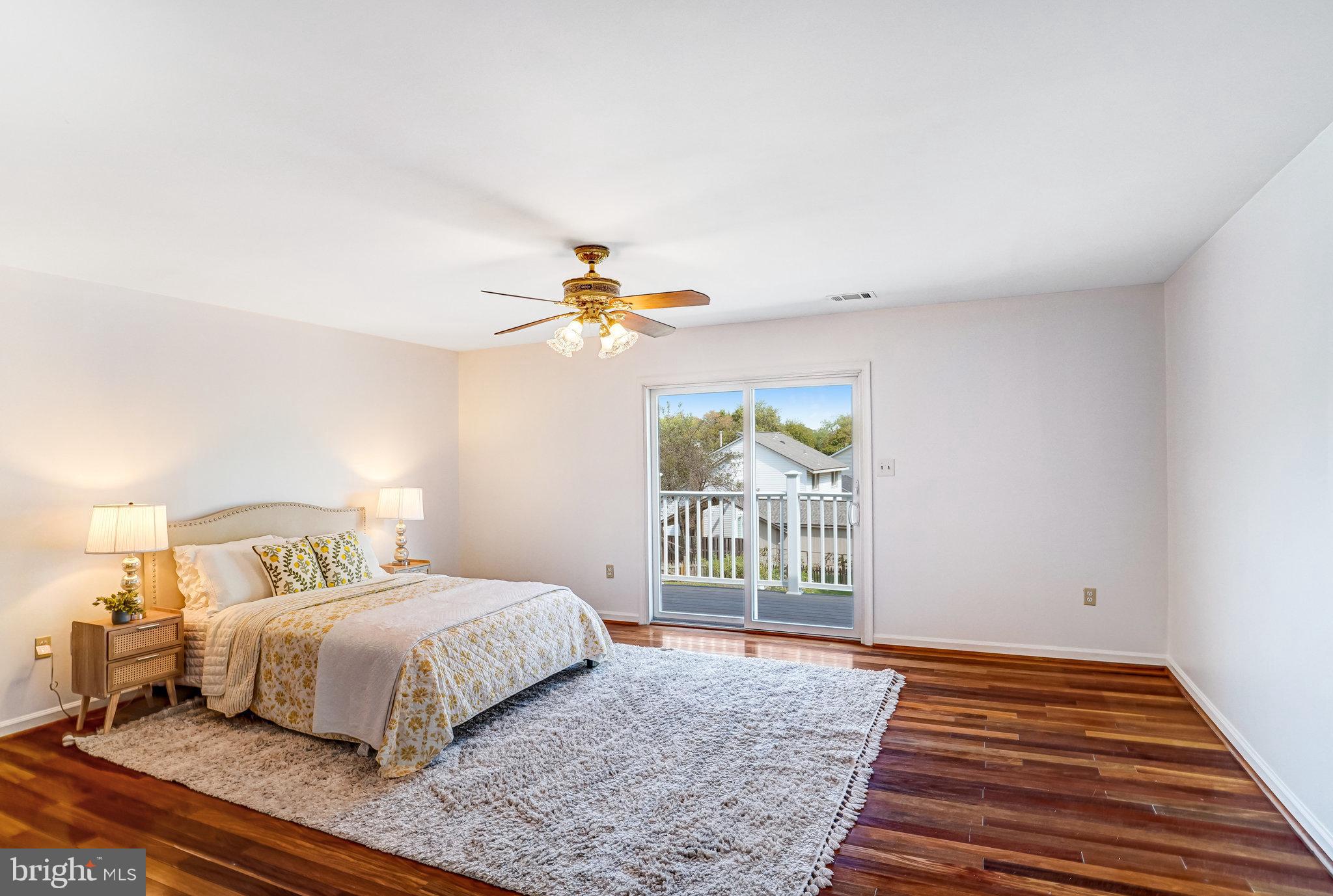 7709 Brandon Way Manassas, VA 20109 - Photo 32 of 40 a bedroom with a bed and a window