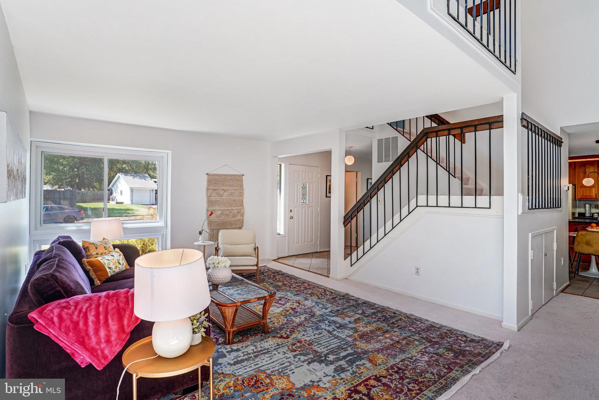 7709 Brandon Way Manassas, VA 20109 - Photo 8 of 40 a living room with furniture and a rug