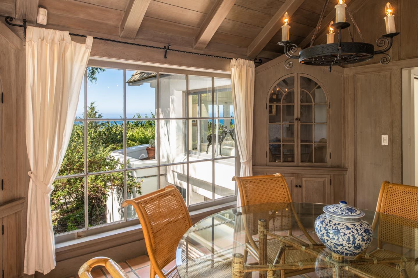 112 Pine Way Carmel Highlands, CA 93923 - Photo 18 of 33 a view of a dining room with furniture window and outside view