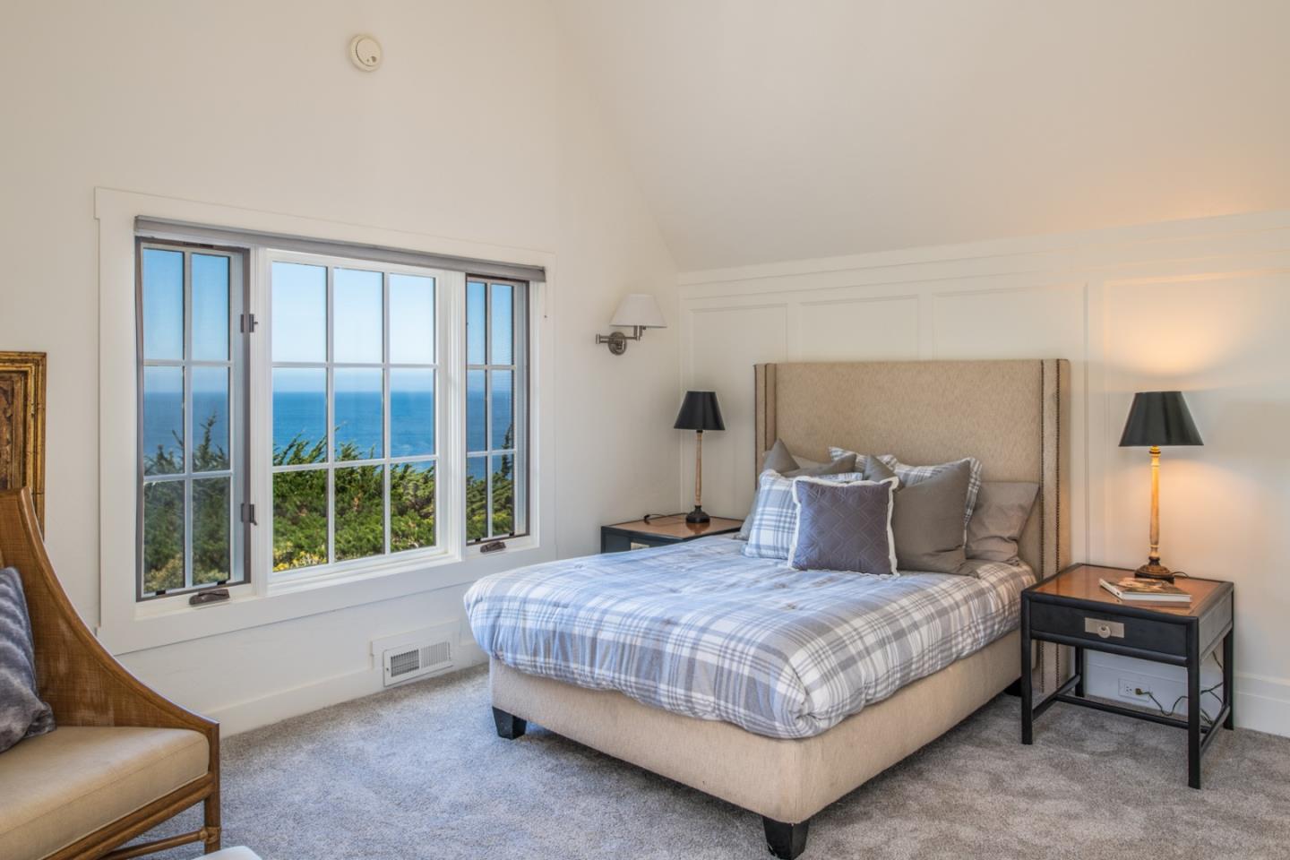 112 Pine Way Carmel Highlands, CA 93923 - Photo 28 of 33 a bedroom with a large bed and a couch