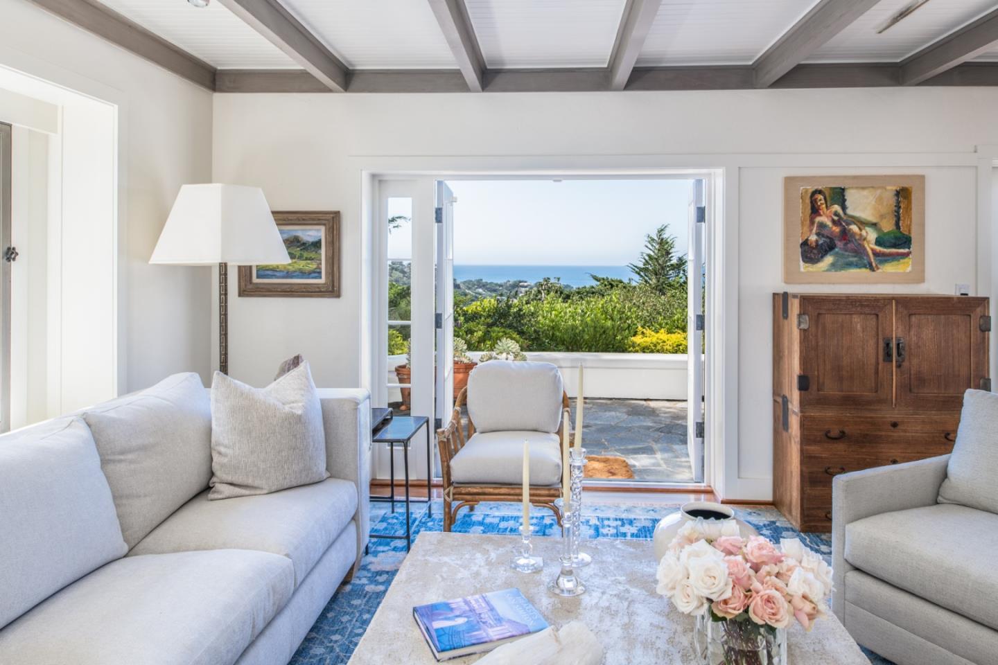 112 Pine Way Carmel Highlands, CA 93923 - Photo 7 of 33 a living room with furniture and a large window