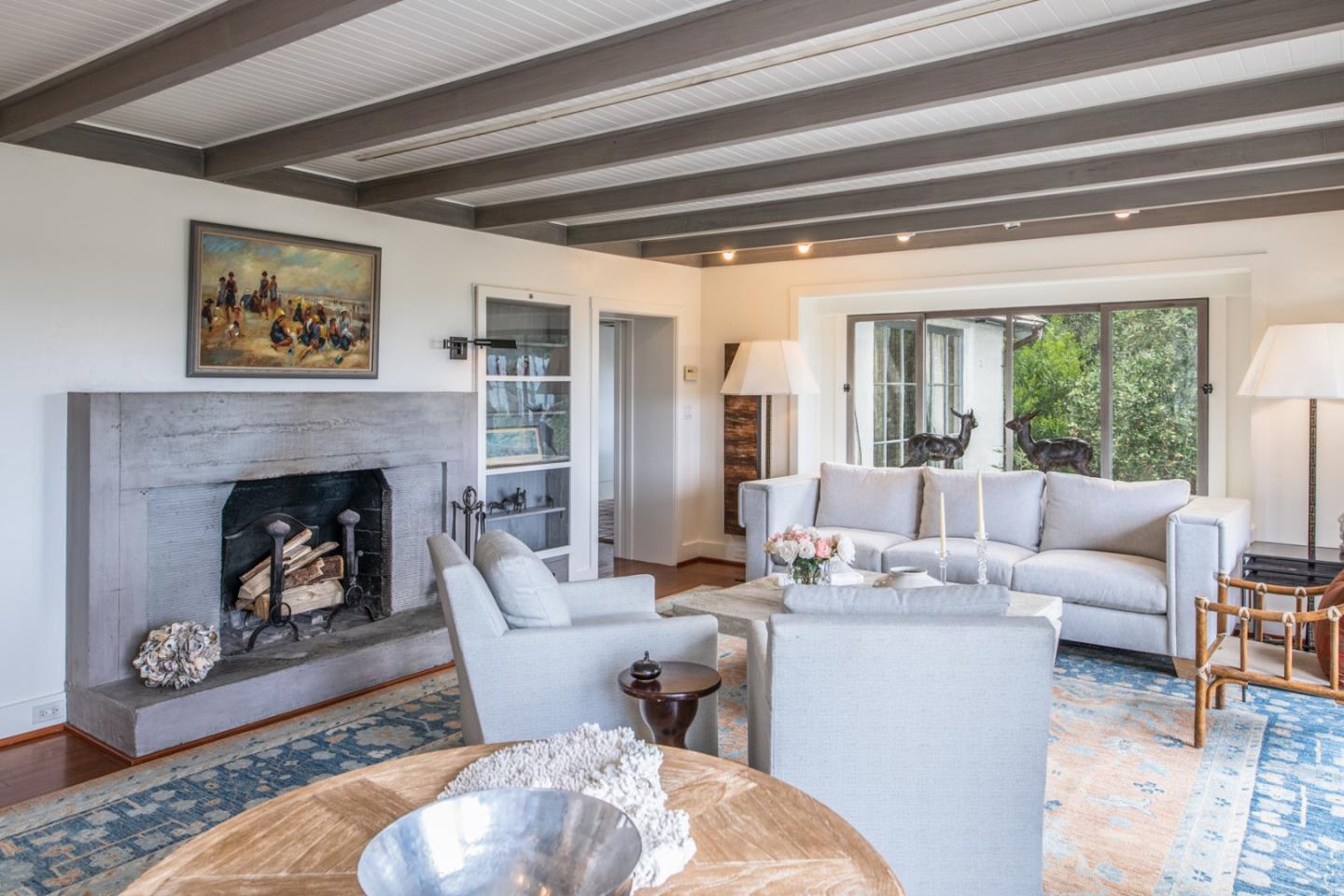 112 Pine Way Carmel Highlands, CA 93923 - Photo 10 of 33 a living room with furniture and a fireplace